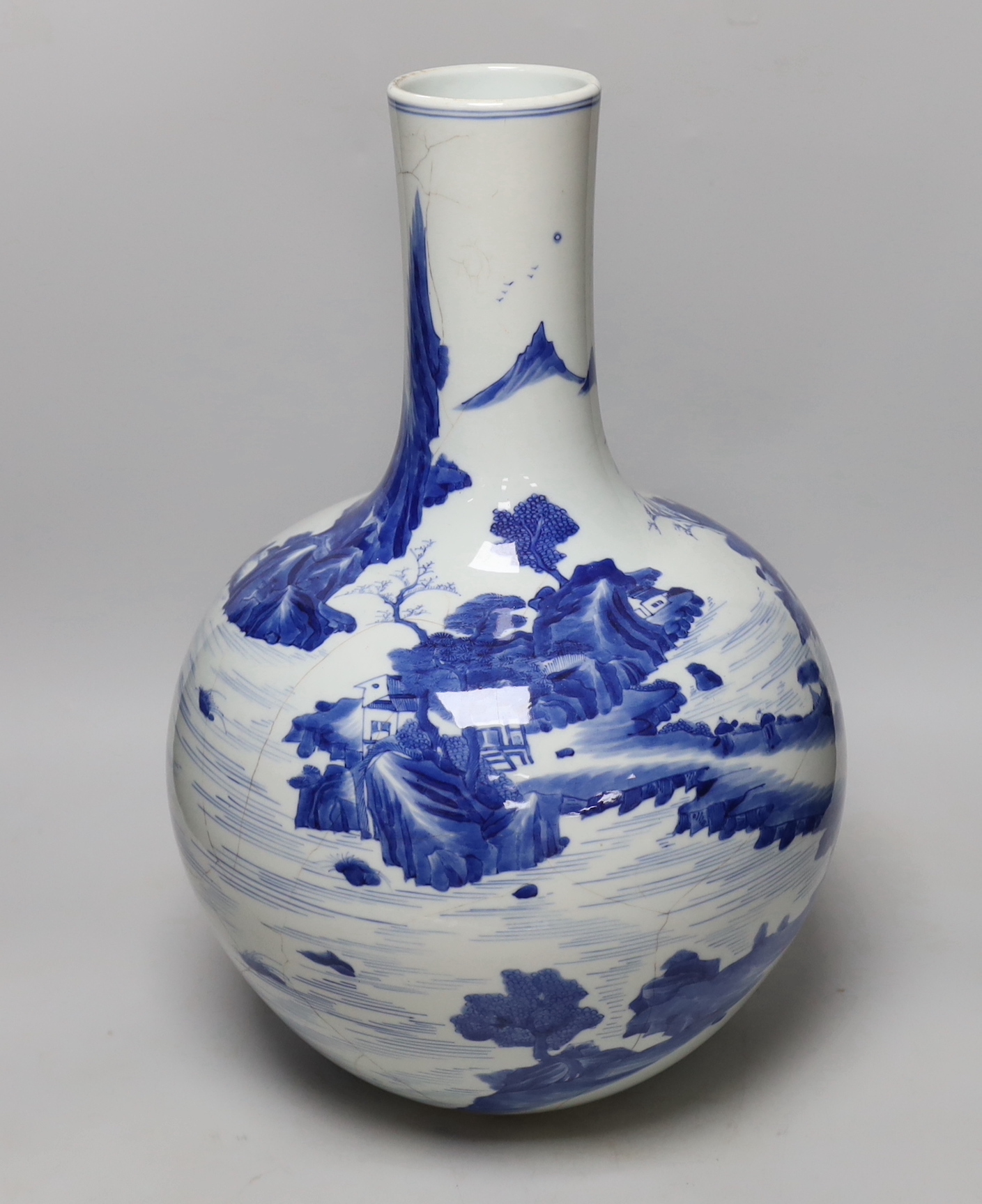 A large Chinese blue and white bottle vase, (a.f) 45cm